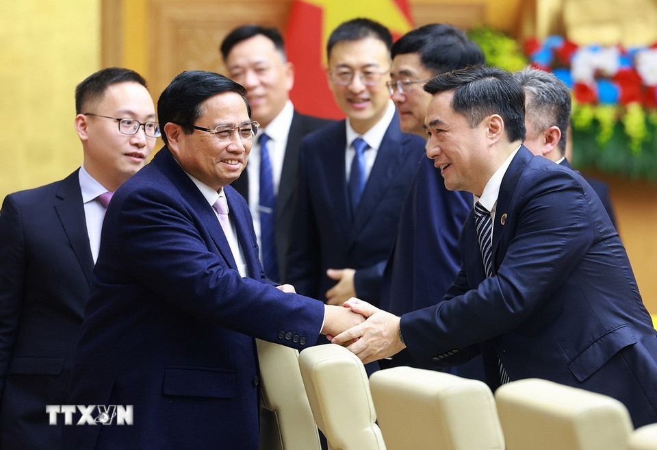 Thủ tướng Phạm Minh Chính với các doanh nghiệp Trung Quốc tham dự tọa đàm. (Ảnh: Dương Giang/TTXVN)