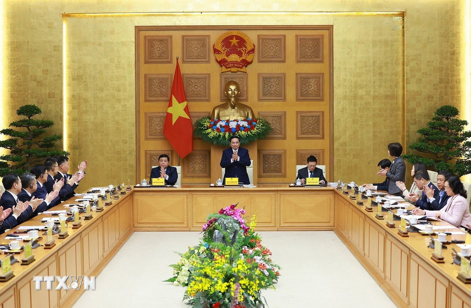 Thủ tướng Phạm Minh Chính chủ trì tọa đàm với các doanh nghiệp Trung Quốc. (Ảnh: Dương Giang/TTXVN)