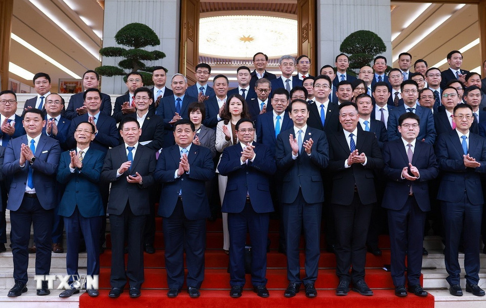 Thủ tướng Phạm Minh Chính với các doanh nghiệp Trung Quốc. (Ảnh: Dương Giang/TTXVN)