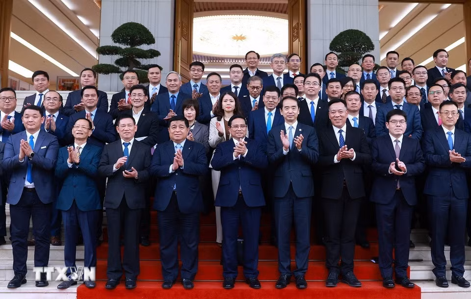Thủ tướng Phạm Minh Chính với các doanh nghiệp Trung Quốc. (Ảnh: Dương Giang/TTXVN)