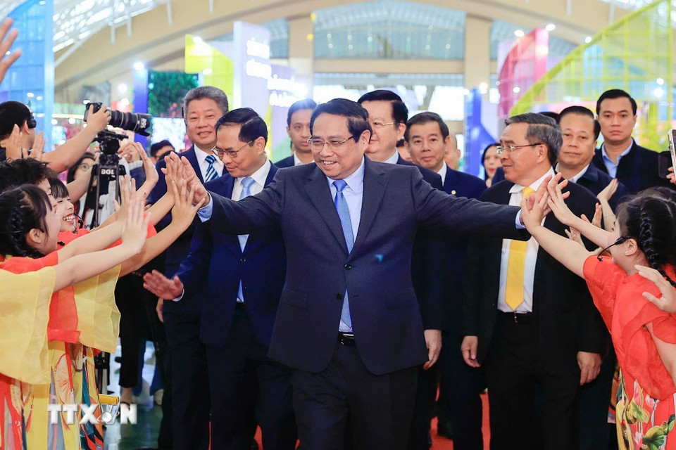 Thủ tướng Phạm Minh Chính đến dự Lễ khai mạc Hội chợ Mùa Xuân lần thứ nhất năm 2026. (Ảnh: Dương Giang/TTXVN)