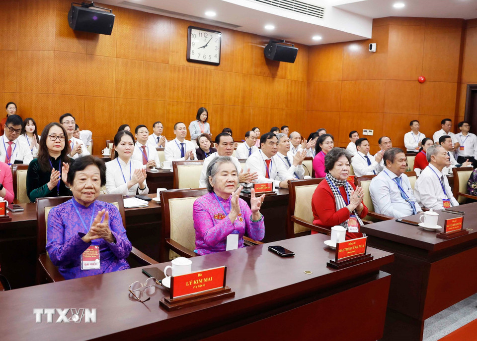 Đại biểu và nhân dân Thành Phố Hồ Chí Minh đến dự. (Ảnh: Thống Nhất/TTXVN)