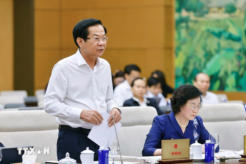 Bộ trưởng Bộ Nội vụ Đỗ Thanh Bình thuyết trình về nội dung cơ bản của dự thảo. (Ảnh: Doãn Tấn/TTXVN)