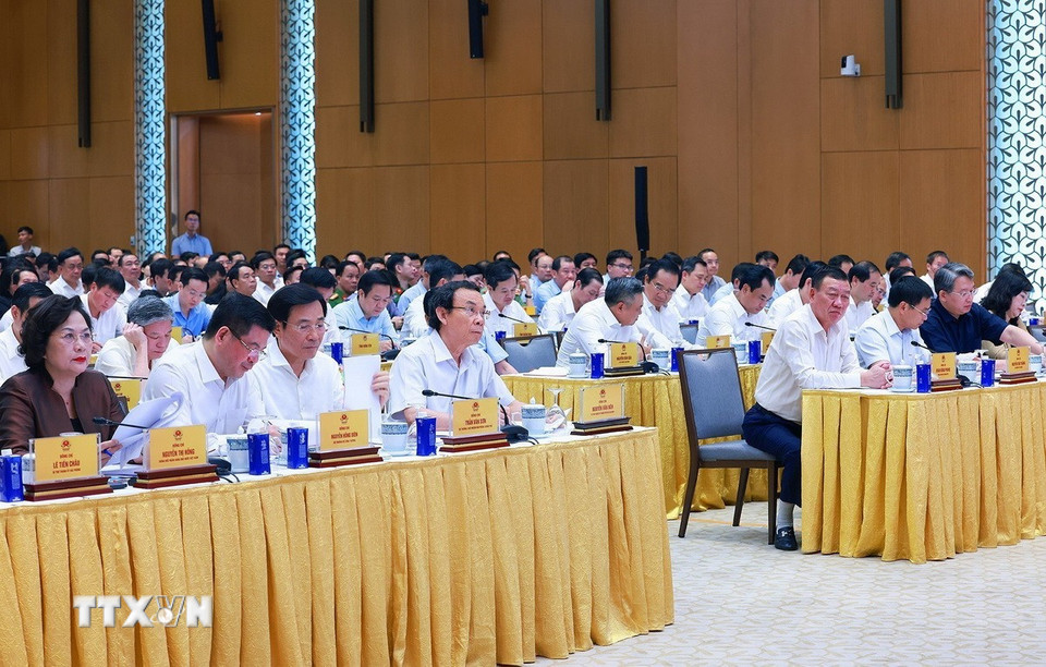 Các đại biểu dự Hội nghị toàn quốc sơ kết, đánh giá kết quả thực hiện việc tháo gỡ khó khăn, vướng mắc cho các dự án, đất đai. (Ảnh: Dương Giang/TTXVN)