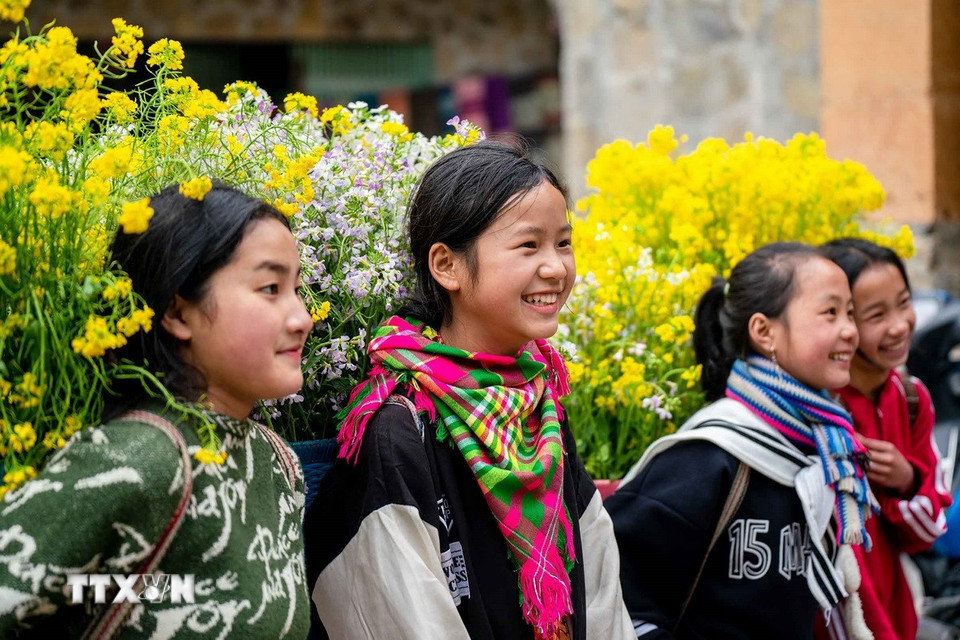 Nét đẹp của con người kết hợp cảnh sắc nơi đây cũng là một điểm thu hút du khách. (Ảnh: Khánh Hòa/TTXVN)