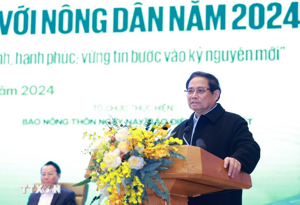 Thủ tướng Phạm Minh Chính đối thoại với nông dân. (Ảnh: Dương Giang/TTXVN)