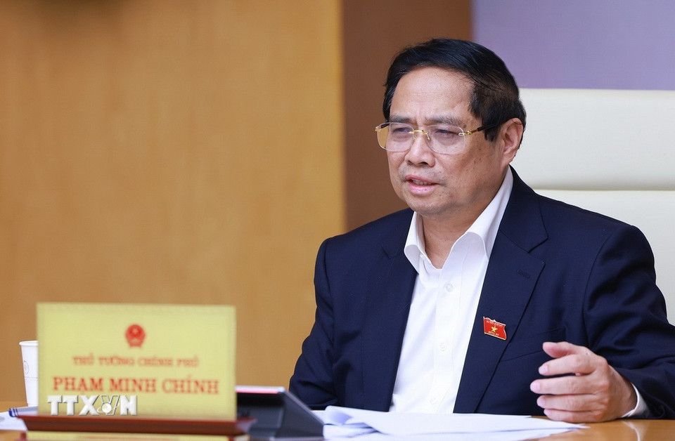 Thủ tướng Phạm Minh Chính chủ trì cuộc làm việc của Thường trực Chính phủ về tình hình thị trường bất động sản. (Ảnh: Dương Giang/TTXVN)