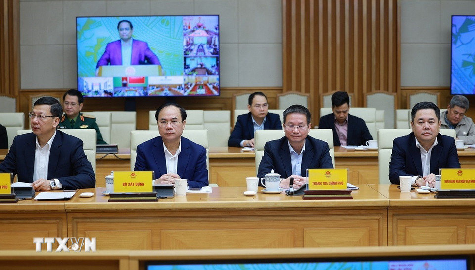 Các đại biểu tham dự Hội nghị sơ kết triển khai xây dựng nhà cho nhân dân bị thiệt hại do bão lũ tại khu vực miền Trung. (Ảnh: Dương Giang/TTXVN)