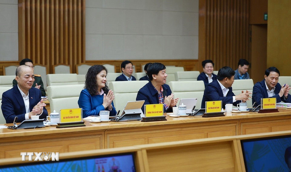 Các đại biểu tham dự Hội nghị sơ kết triển khai xây dựng nhà cho nhân dân bị thiệt hại do bão lũ tại khu vực miền Trung. (Ảnh: Dương Giang/TTXVN)