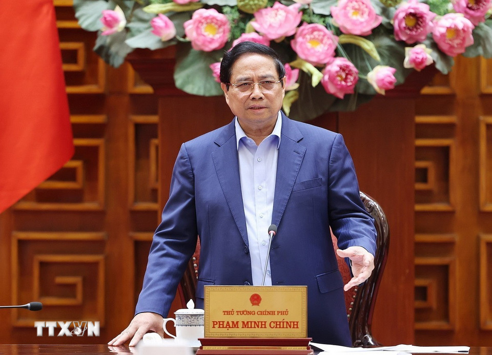 Thủ tướng Phạm Minh Chính chủ trì họp khắc phục hậu quả thiên tai sau bão. (Ảnh: Dương Giang/TTXVN)