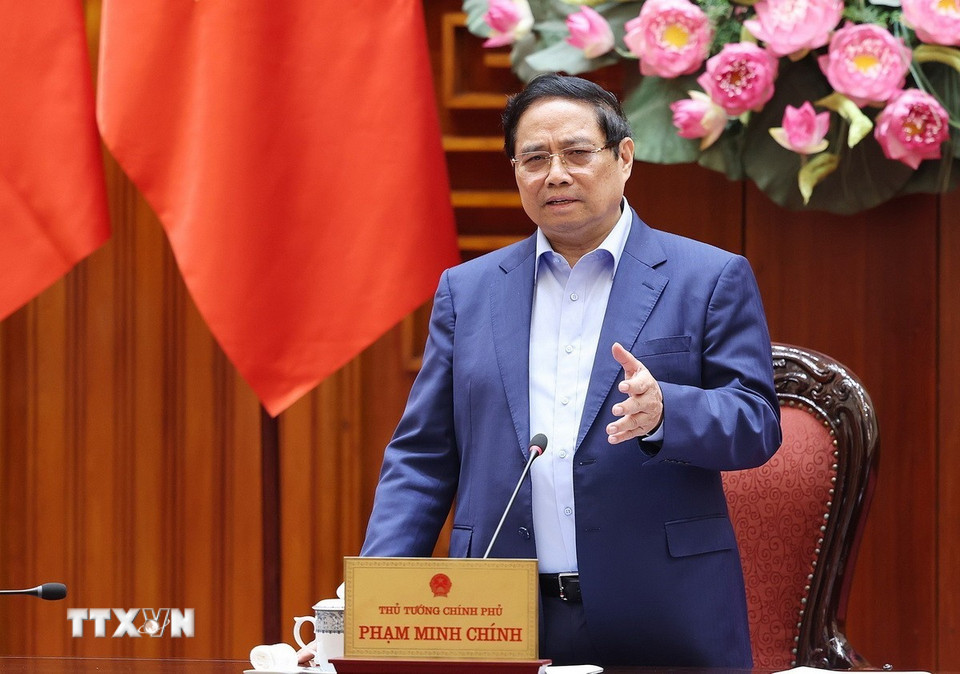 Thủ tướng Phạm Minh Chính chủ trì họp khắc phục hậu quả thiên tai sau bão. (Ảnh: Dương Giang/TTXVN)