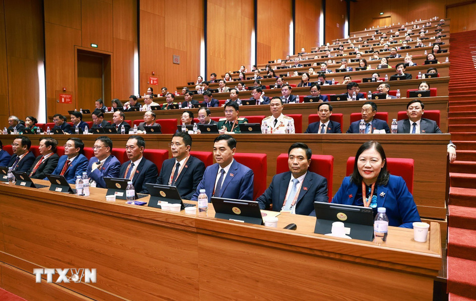 Đoàn đại biểu Đảng bộ tỉnh Thanh Hóa dự phiên thảo luận tại hội trường về các văn kiện Đại hội, chiều 21/1. (Ảnh: TTXVN)