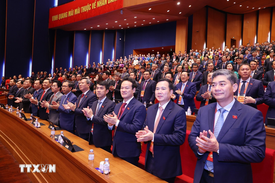 Các đại biểu dự phiên thảo luận tại hội trường về các văn kiện Đại hội, chiều 21/1. (Ảnh: TTXVN)