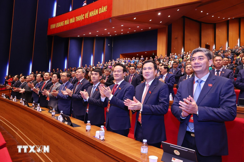 Các đại biểu dự phiên thảo luận tại hội trường về các văn kiện Đại hội, chiều 21/1. (Ảnh: TTXVN)