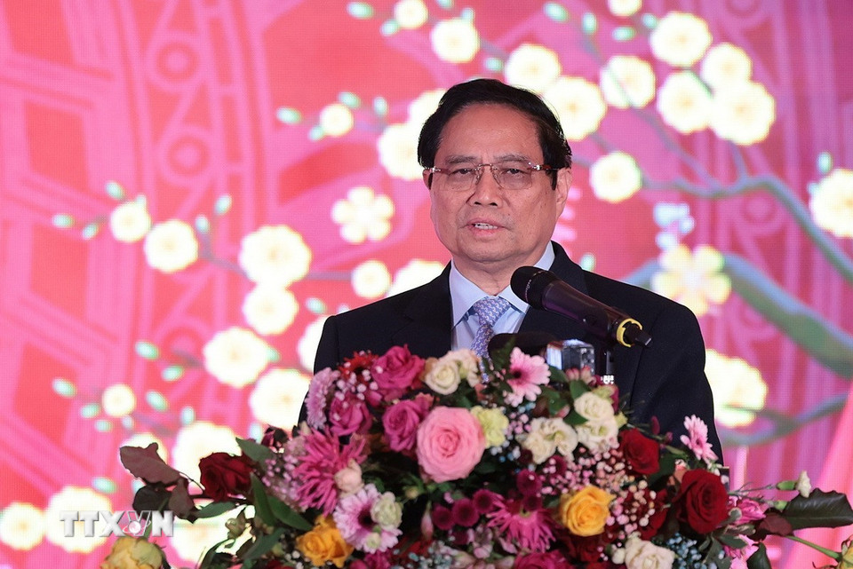 Thủ tướng Phạm Minh Chính gửi lời chúc mừng năm mới cộng đồng người Việt Nam tại Ba Lan. (Ảnh: Dương Giang/TTXVN)