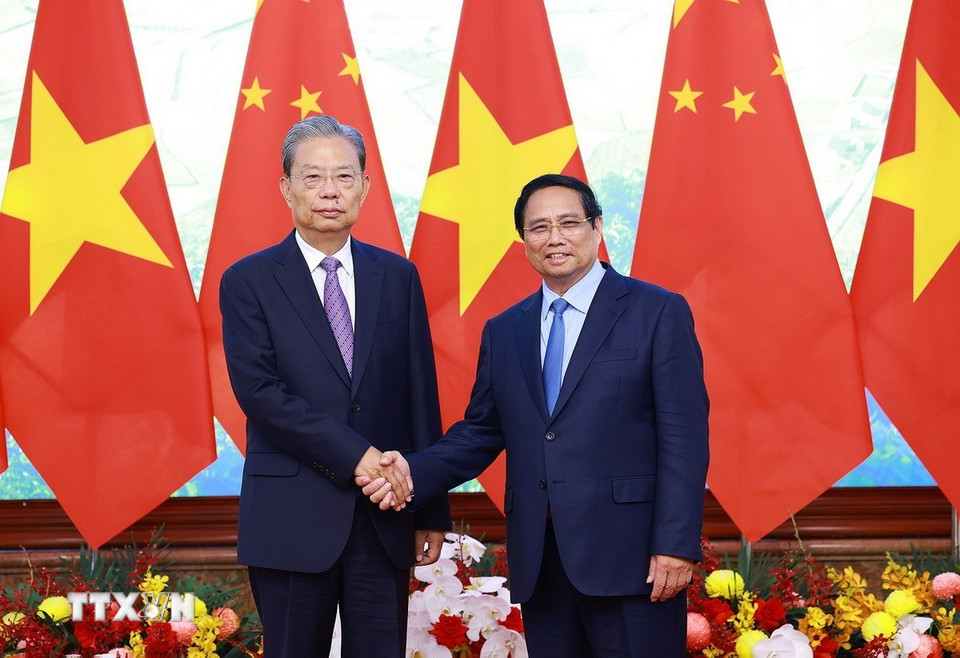 Thủ tướng Phạm Minh Chính hội kiến Ủy viên trưởng Nhân đại toàn quốc Trung Quốc Triệu Lạc Tế. Ảnh: Dương Giang-TTXVN