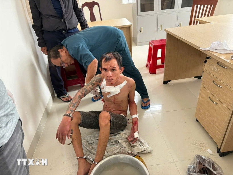 Đối tượng Nguyễn Văn Ty tại cơ quan công an. (Ảnh: TTXVN phát)