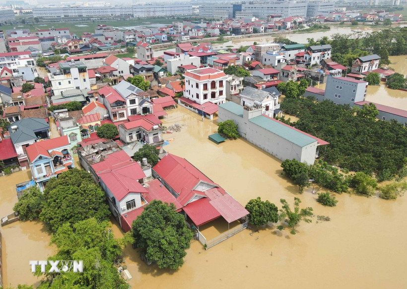 Nhiều khu vực của Bắc Ninh bị nước lũ bủa vây. (Ảnh: Thanh Thương/TTXVN)