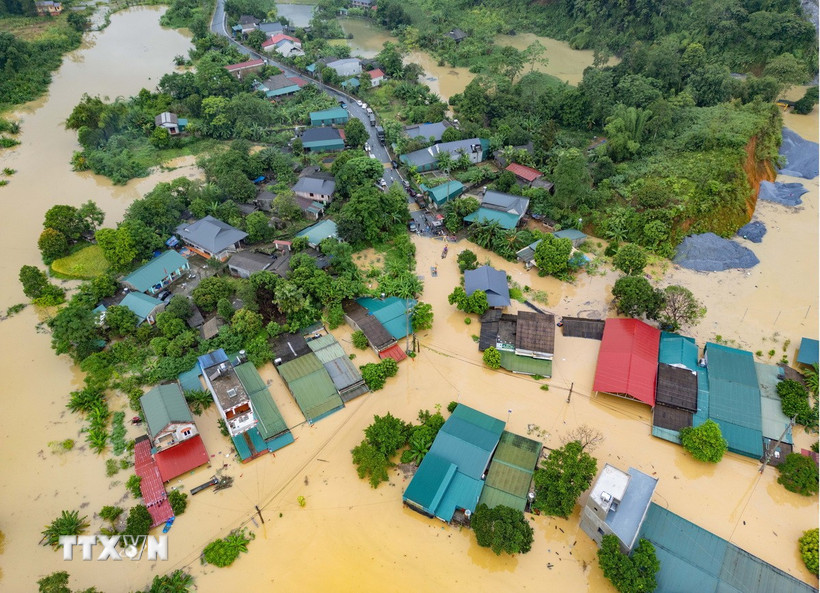 Ngập lụt trên diện rộng ở các phường Hà Giang 1, 2 (Tuyên Quang). (Ảnh: TTXVN phát)