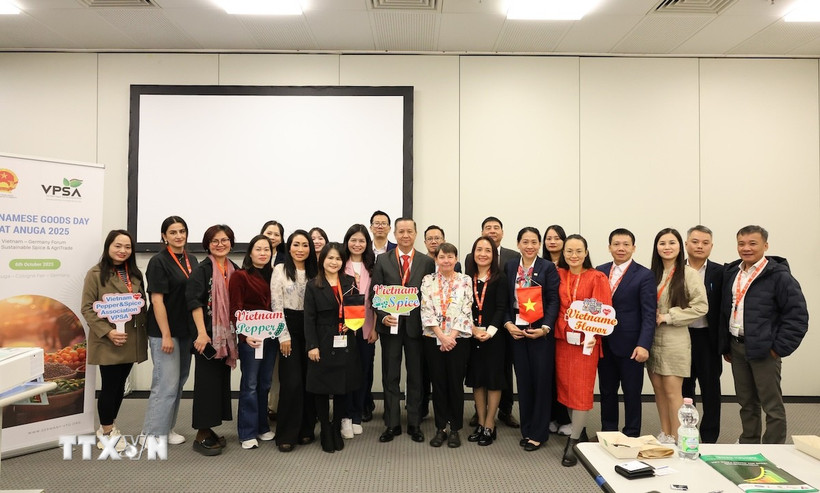 Các đại biểu tham dự Diễn đàn Việt Nam-Đức về thúc đẩy thương mại nông sản và gia vị bền vững. (Ảnh: Thu Hằng /TTXVN)