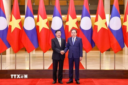 Chủ tịch Quốc hội Trần Thanh Mẫn hội kiến Tổng Bí thư, Chủ tịch nước Lào Thongloun Sisoulith. (Ảnh: Doãn Tấn/TTXVN)