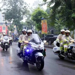 Lễ giễu hành, ra quân của các lực lượng, phương tiện của Công an thành phố Hà Nội. Ảnh: Phạm Kiên/TTXVN)