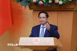 Thủ tướng Phạm Minh Chính chủ trì họp đánh giá kết quả vận hành mô hình chính quyền địa phương hai cấp. (Ảnh: Dương Giang/TTXVN)