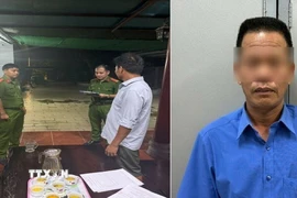 Đại diện Cơ quan điều tra đọc lệnh bắt tạm giam bị can Nguyễn Ngọc Thắng. (Ảnh: TTXVN phát)