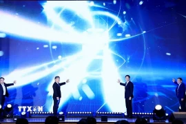 Các đại biểu thực hiện Nghi thức phát động chương trình. (Ảnh: Tuấn Anh/TTXVN)