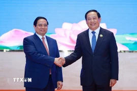 Thủ tướng Phạm Minh Chính và Thủ tướng Lào Sonexay Siphandone đồng chủ trì Kỳ họp lần thứ 48 Ủy ban liên Chính phủ về hợp tác song phương Việt Nam-Lào. (Ảnh: Dương Giang/TTXVN)