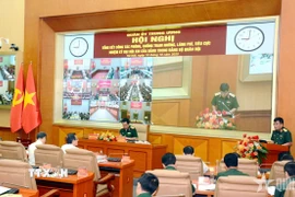 Quang cảnh hội nghị tại điểm cầu trung tâm. (Nguồng: Báo Quân đội Nhân dân)