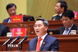 Đồng chí Nguyễn Tấn Phát, Thành ủy viên, Bí thư Đảng ủy phường Sài Gòn (Thành phố Hồ Chí Minh), trình bày tham luận “Lãnh đạo phát triển kinh tế tư nhân nhanh và bền vững”. (Ảnh: TTXVN)