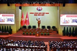 Phiên thảo luận tại hội trường về các văn kiện Đại hội, chiều 21/1. (Ảnh: TTXVN)