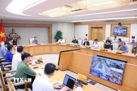 Quang cảnh cuộc họp triển khai công tác ứng phó với cơn bão số 12 (bão Fengshen) và sau mưa bão. (Ảnh: Văn Điệp/TTXVN)