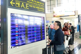 thông tư 12 đã sửa đổi quy định về tiêu chuẩn mua vé máy bay đi công tác trong nước. (Ảnh: Quốc Khánh/TTXVN)