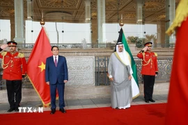 Thủ tướng Nhà nước Kuwait Sheikh Ahmad Abdullah Al-Ahmad Al Sabah đón Thủ tướng Phạm Minh Chính thăm chính thức Kuwait. (Ảnh: Dương Giang/TTXVN)