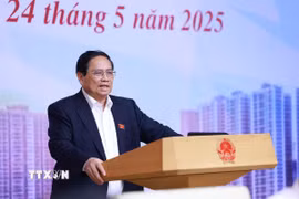 Thủ tướng Phạm Minh Chính chủ trì cuộc làm việc của Thường trực Chính phủ với các bộ, ngành, chuyên gia, ngân hàng về tình hình thị trường vàng. (Ảnh: Dương Giang/TTXVN)