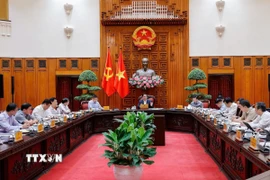 Thủ tướng Phạm Minh Chính chủ trì cuộc họp với các bộ, ngành để chuẩn bị đàm phán thương mại với phía Hoa Kỳ. (Ảnh: Dương Giang/TTXVN)