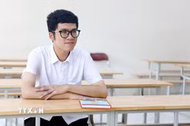 Theo Hoàng Quang Minh, bí quyết học tập của em khá đơn giản, với bất cứ môn học nào cũng phải học để hiểu bản chất thay vì chỉ ghi nhớ công thức hay mẹo làm bài. (Ảnh: Thế Duyệt/TTXVN)
