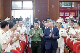 Tổng Bí thư Tô Lâm đến thăm và làm việc với Cục Cảnh sát Hình sự, Bộ Công an. (Ảnh: Thống Nhất/TTXVN)