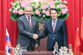 Đại tướng Lương Tam Quang, Bộ trưởng Bộ Công an Việt Nam với Thư ký Hội đồng An ninh Liên bang Nga Sergei Shoigu. (Ảnh: Phạm Kiên/TTXVN)