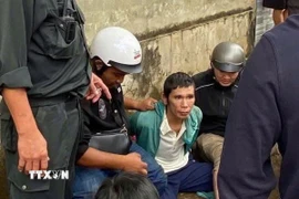 Nghi phạm Nguyễn Nam Đại Thuận bị công an bắt giữ. (Ảnh: TTXVN phát)