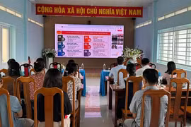Học viên tham gia Lớp bồi dưỡng nâng cao năng lực, xử lý tình huống thực tiễn đối với đội ngũ cán bộ cơ sở ở điểm đầu cầu Thành phố Hồ Chí Minh. (Ảnh: Hữu Duyên/TTXVN)
