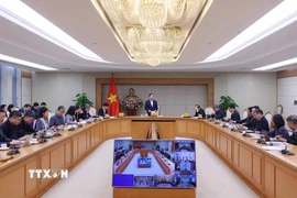 Phó Thủ tướng Trần Hồng Hà chủ trì cuộc họp nghe báo cáo hoàn thiện dự thảo Nghị định về một số chính sách phát triển thủy sản, kết nối trực tuyến với điểm cầu của 6 tỉnh, thành phố ven biển. (Ảnh: Văn Điệp/TTXVN)