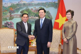 Phó Thủ tướng Mai Văn Chính tiếp Tổng giám đốc Thông tấn xã Pathet Lào Vannasin Simmavong. (Ảnh: Văn Điệp/TTXVN)