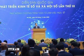 Thủ tướng Phạm Minh Chính phát biểu chỉ đạo tại Diễn đàn Quốc gia phát triển kinh tế số và xã hội số lần thứ 3. (Ảnh: Dương Giang/TTXVN)