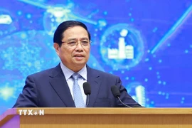 Thủ tướng Phạm Minh Chính phát biểu chỉ đạo tại Diễn đàn Quốc gia phát triển kinh tế số và xã hội số lần thứ 3. (Ảnh: Dương Giang/TTXVN)