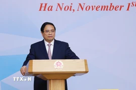 Thủ tướng Phạm Minh Chính chủ trì Hội nghị tham vấn các chuyên gia, tổ chức trong nước và quốc tế về thành lập Trung tâm tài chính quốc tế tại Việt Nam. (Ảnh: Dương Giang/TTXVN)