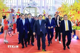Thủ tướng Phạm Minh Chính đến dự Lễ khai mạc Hội chợ Mùa Xuân lần thứ nhất năm 2026. (Ảnh: Dương Giang/TTXVN)