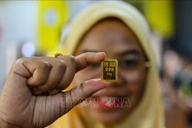 Vàng miếng được bán tại Kota Bharu, bang Kelantan, Malaysia. (Ảnh: AFP/TTXVN)